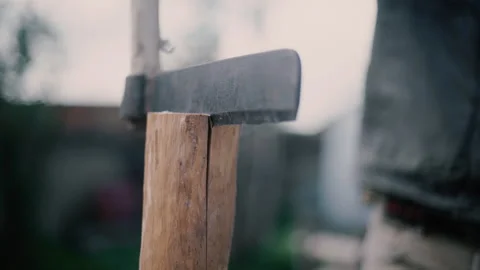 Carpenter splits log into two with froe, traditional tool, slow motion Stock Footage 271196308