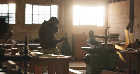 Carpenter, stress and man with tablet in workshop for supplier delay, order Stock Footage 341380585