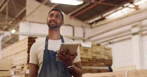 Carpenter, tablet and man in workshop, thinking and planning for production.. Stock Photos