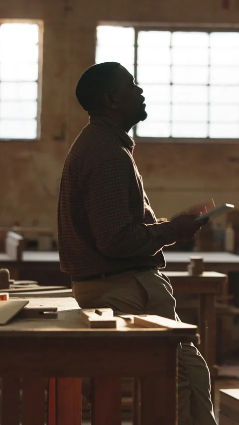 Carpenter, thinking and black man on tablet in workshop for bad news, hope and Stock Footage 343841992
