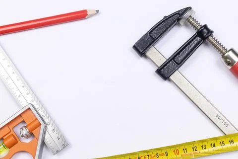 Carpenter Tools above white background with copy space Stock Photos
