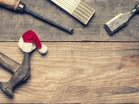 Carpenter tools with the hat of Santa Stock Photos