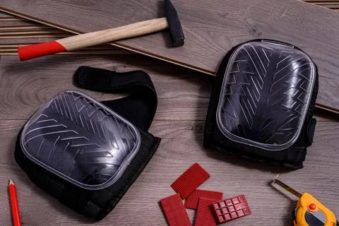 Carpenter tools on laminated flooring Stock Photos