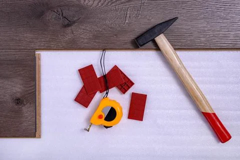 Carpenter tools on laminated flooring Stock Photos