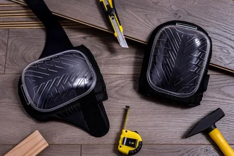 Carpenter tools on laminated flooring Stock Photos