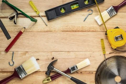 Carpenter tools on wood board Stock Photos