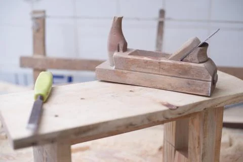 Carpenter tools on wood table background. Copy space Stock Photos