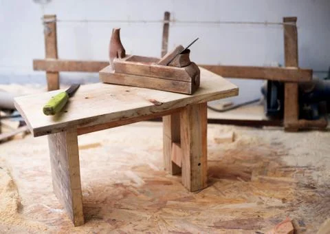 Carpenter tools on wood table background. Copy space Stock Photos