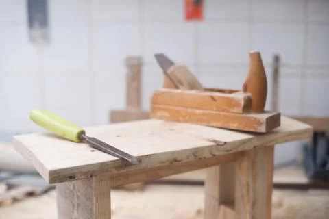 Carpenter tools on wood table background. Copy space Stock Photos