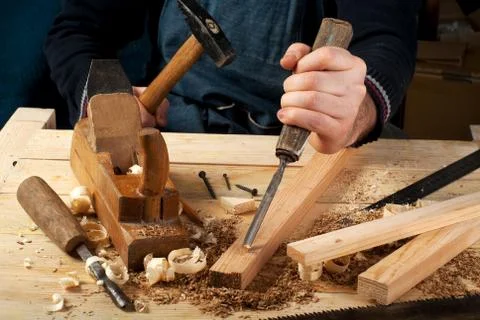 Carpenter tools on wood table background. Top view. Copy space Stock Photos