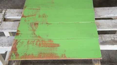 Carpenter use brush paint green color for coating wood board Video stock 49187207