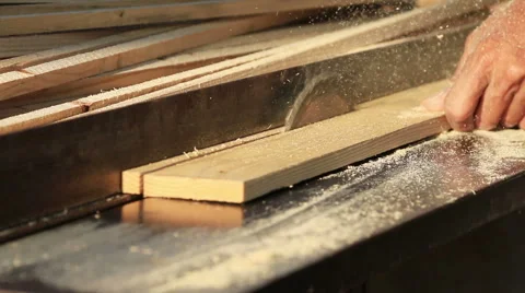 Carpenter use circular table electric saw cutting wood in workshop. Stock Footage 45585963