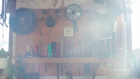 The carpenter uses a different hand tool Stockbeeldmateriaal 85527779