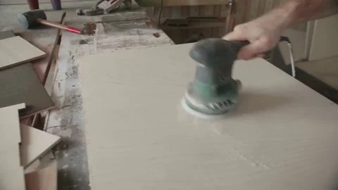 Carpenter uses a grinding machine to align Video stock 153494669