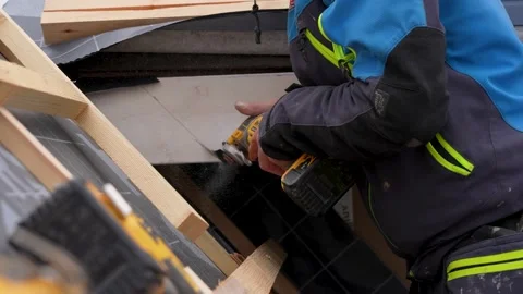 Carpenter using a bayonet saw Stock Footage 235705052