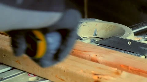 Carpenter using chop saw power tool closeup Stock Footage 49526160