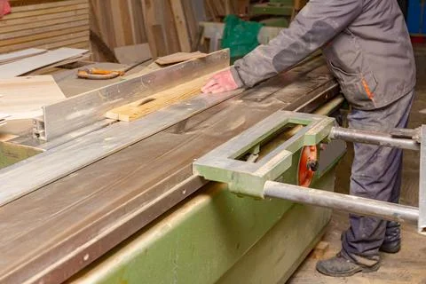 Carpenter is using circular saw to cut, to makes clean precise cut Stock Photos