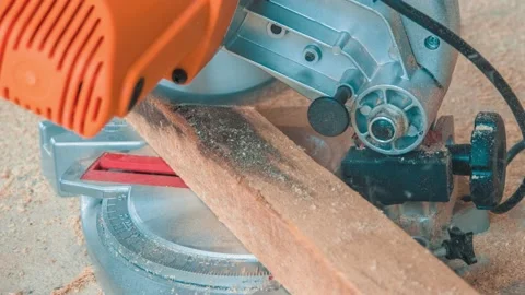 Carpenter Using Circular Saw for Cutting Wooden Boards Stock Footage 153039159