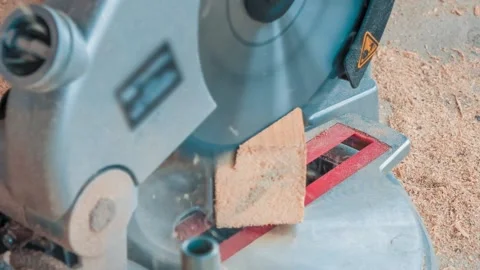 Carpenter Using Circular Saw for Cutting Wooden Boards Stock Footage 153039296