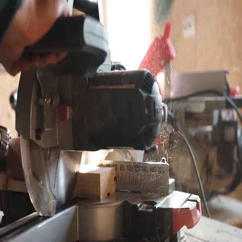 Carpenter Using Circular Saw for wood in close up Stock Footage 69537726