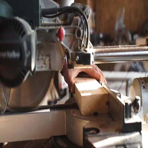 Carpenter Using Circular Saw for wood in close up Stock Footage 69537763