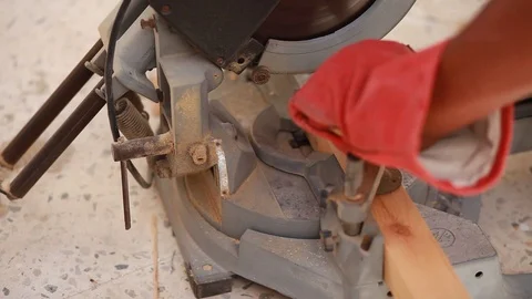 Carpenter Using Circular Saw.The worker makes a cut on a circular saw. Stock Footage 120534643
