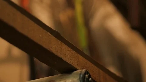 Carpenter using clamp for tightennig wood Stock Footage 73674253