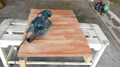 Carpenter using electric sander Video stock 50345916