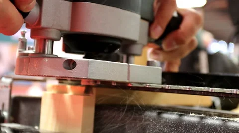 Carpenter using power tool for shape cutting Stock Footage 64912814