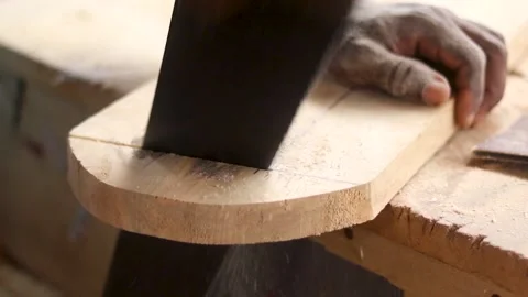Carpenter using saw to cut wood. Carpentry works. Stock Footage 223790355