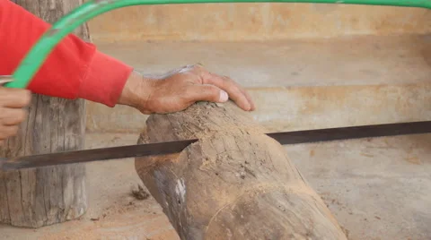 Carpenter Using Saw for wood timber Stock-Footage 63355404