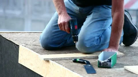 Carpenter using a screwdriver Stock Footage 11033274
