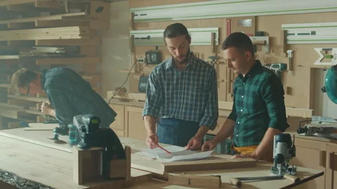 Carpenter Using a Tape Measure Ruler to Measuring Wood Board Stock Footage 224169464