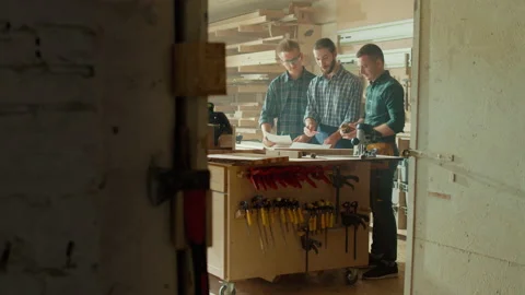 Carpenter Using a Tape Measure Ruler to Measuring Wood Board. Manual Labor. Stock Footage 224169996