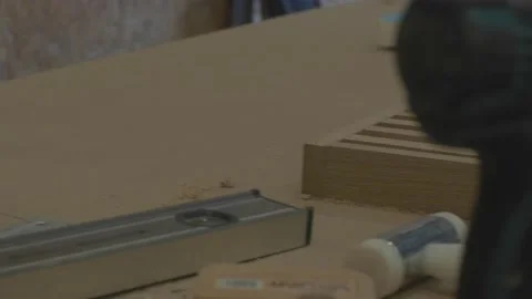 Carpenter using tools to create detailed wall piece Video stock 139449164