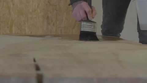 Carpenter using tools to create detailed wall piece Stock Footage 139449211