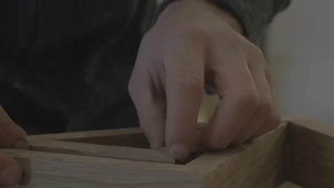 Carpenter using tools to create detailed wall piece Video stock 139449254