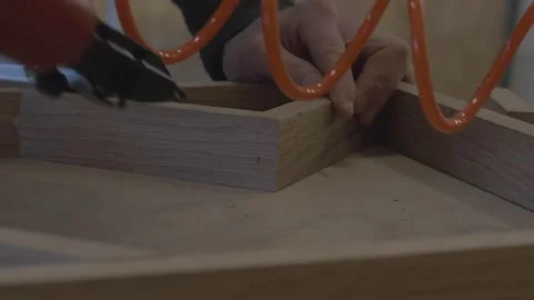 Carpenter using tools to create detailed wall piece Stock Footage 139449259