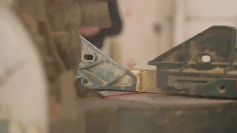 Carpenter using tools to create detailed wall piece Stock Footage 139449300