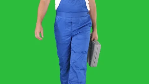 Carpenter walking on a Green Screen, Chroma Key. Stock-Footage 109312659