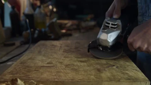 Carpenter while working in his workshop Video stock 131966369