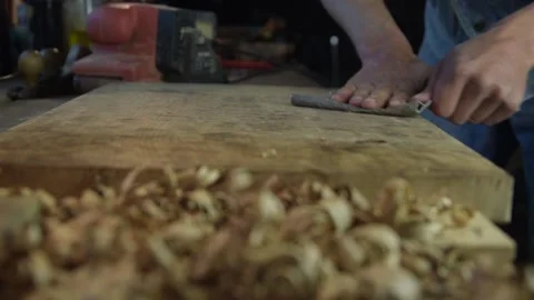 Carpenter while working in his workshop Video stock 131966392