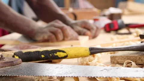 Carpenter at work, carpenter sand papering wood, applying sandpaper,  Stock Footage 223790388