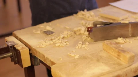 Carpenter work with Hand jack plane, wood chips Stock Footage 59231387