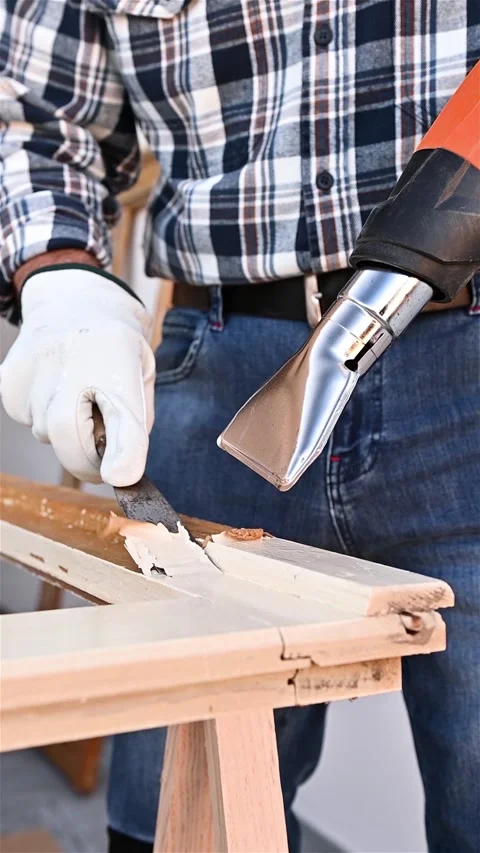 Carpenter at work, restoring an old wooden window. Carpentry. Stock Footage 322761424