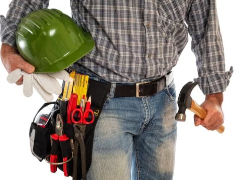 Carpenter with work tools on a white background. Stock Photos