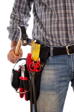 Carpenter with work tools on a white background. Stock Photos
