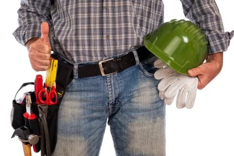 Carpenter with work tools on a white background. Stock Photos