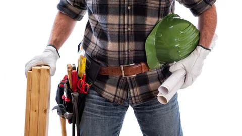 Carpenter with work tools on a white background. Carpentry. Stock Photos