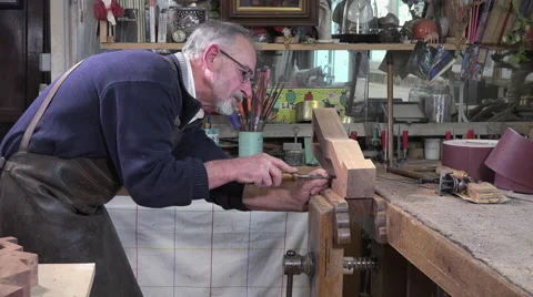 Carpenter working with a chisel Stock Footage 58011611